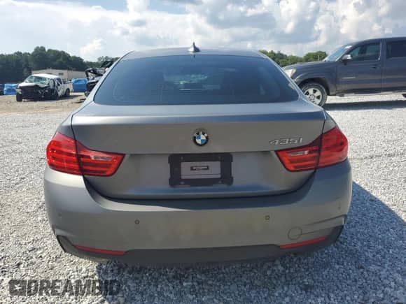 2015 BMW 4 Series 435i with VIN WBA4B1C51FG241443, listed as a Copart auction lot 61026285 with 149,384 mi miles and Salvage title. Bid and sale history available at DreamBid. Image 6.