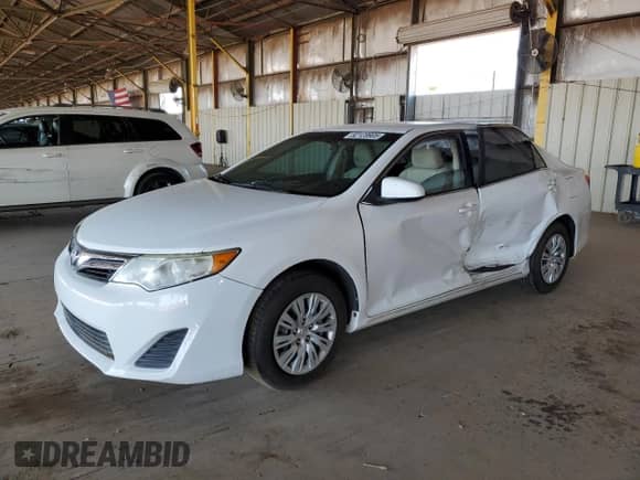 2014 Toyota Camry LE with VIN 4T4BF1FK0ER400843, listed as a Copart auction lot 82128905 with 98,473 mi miles and Salvage title. Bid and sale history available at DreamBid. Image 1.