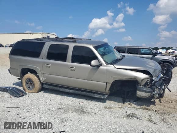 2002 Chevrolet Suburban LT с VIN 3GNGK26G22G133986, выставлен на аукционе Copart как лот 69277985 с пробегом Не указан миль и Списание • Salvage title. История ставок и продаж доступна на DreamBid. Изображение 4.