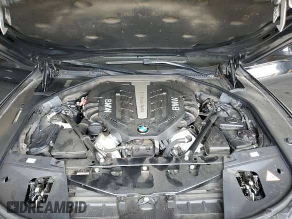 2012 BMW 7 Series 750i xDrive with VIN WBAKC6C56CC396851, listed as a Copart auction lot 64007085 with 149,218 mi miles and Clean title. Bid and sale history available at DreamBid. Image 11.