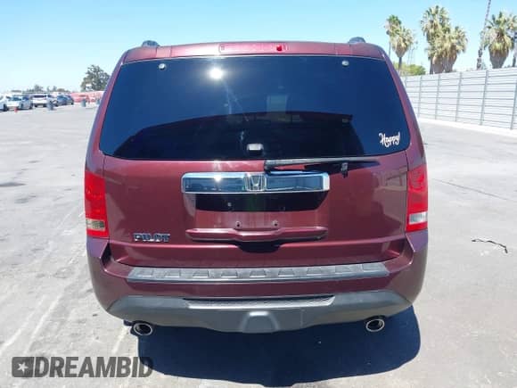 2014 Honda Pilot EX-L with VIN 5FNYF3H5XEB009008, listed as a IAAI auction lot 43024881 with 119,646 mi miles and . Bid and sale history available at DreamBid. Image 16.