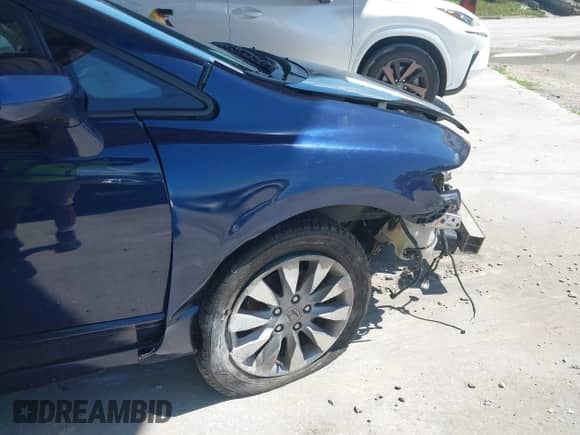 2009 Honda Civic with VIN 1HGFA15959L009469, listed as a IAAI auction lot 42267635 with 221,969 mi miles and . Bid and sale history available at DreamBid. Image 13.