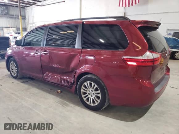 2015 Toyota Sienna XLE with VIN 5TDYK3DC8FS669402, listed as a Copart auction lot 71993775 with 187,428 mi miles and Salvage title. Bid and sale history available at DreamBid. Image 2.