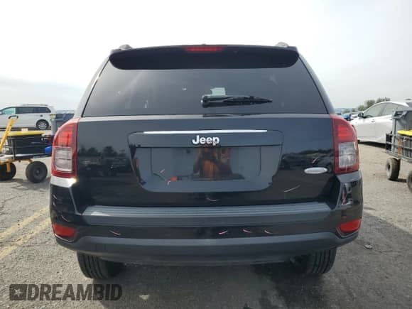 2014 Jeep Compass Latitude with VIN 1C4NJCEB1ED522330, listed as a Copart auction lot 84630415 with 150,480 mi miles and Salvage title. Bid and sale history available at DreamBid. Image 6.