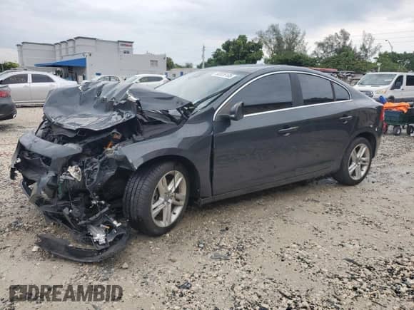 2015 Volvo S60 T5 Drive-E Premier with VIN YV140MFK4F1348785, listed as a Copart auction lot 80026105 with 74,217 mi miles and Salvage title. Bid and sale history available at DreamBid. Image 1.