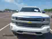 2016 Chevrolet Silverado 1500 High Country z VIN 3GCUKTEC6GG229479, wystawiony jako IAAI lot #42683779 z przebiegiem 128 993 mil mil oraz . Historia ofert i sprzedaży dostępna na DreamBid. Obrazek 12.