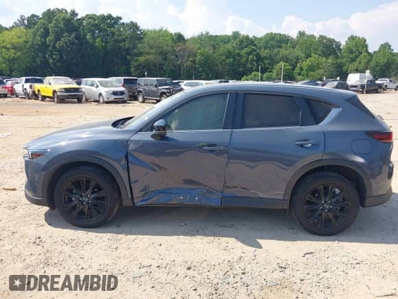 2022 Mazda CX-5 S Preferred z VIN JM3KFBCMXN1534309, wystawiony jako IAAI lot #42600606 z przebiegiem 40 529 mil mil oraz . Historia ofert i sprzedaży dostępna na DreamBid. Obrazek 14.