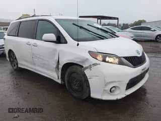 2014 Toyota Sienna SE with VIN 5TDXK3DC8ES441989, listed as a IAAI auction lot 43420437 with 183,733 mi miles and . Bid and sale history available at DreamBid. Image 1.