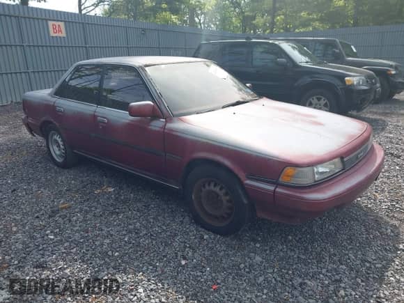 1988 Toyota Camry LE z VIN JT2SV22E8J0149068, wystawiony jako IAAI lot #42342495 z przebiegiem 228 670 mil mil oraz . Historia ofert i sprzedaży dostępna na DreamBid. Obrazek 1.