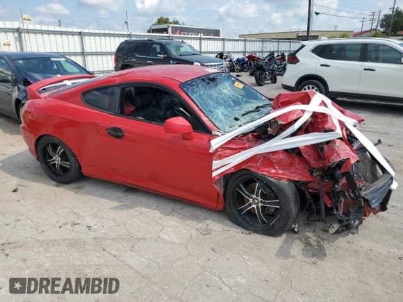 2004 Hyundai Tiburon GT с VIN KMHHN65F84U134351, выставлен на аукционе Copart как лот 68748105 с пробегом Не указан миль и Списание • Salvage title. История ставок и продаж доступна на DreamBid. Изображение 4.