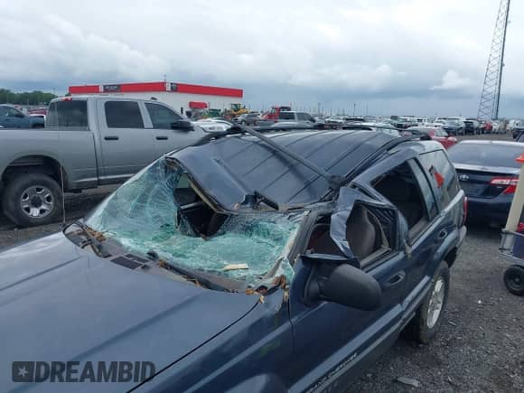 2004 Jeep Grand Cherokee Laredo with VIN 1J4GX48S34C213420, listed as a IAAI auction lot 42221769 with 194,163 mi miles and . Bid and sale history available at DreamBid. Image 6.
