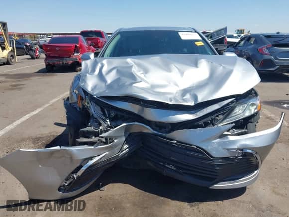 2021 Toyota Camry Hybrid XLE with VIN 4T1F31AK2MU547062, listed as a IAAI auction lot 42405027 with 170,899 mi miles and . Bid and sale history available at DreamBid. Image 12.