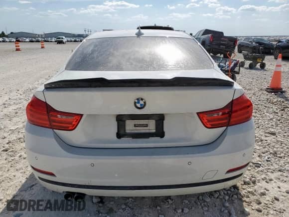 2015 BMW 4 Series 428i с VIN WBA3N3C58FK234890, выставлен на аукционе Copart как лот 65902975 с пробегом 115 422 миль миль и Списание • Salvage title. История ставок и продаж доступна на DreamBid. Изображение 6.