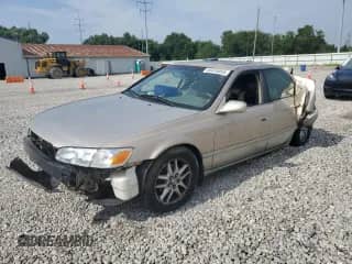 2001 Toyota Camry LE with VIN JT2BF22K710318998, listed as a Copart auction lot 65418895 with Not provided miles and Salvage title. Bid and sale history available at DreamBid. Image 1.