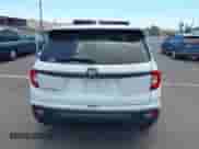 2021 Honda Passport EX-L with VIN 5FNYF7H59MB001083, listed as a IAAI auction lot 42943781 with 56,549 mi miles and . Bid and sale history available at DreamBid. Image 16.