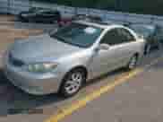2005 Toyota Camry LE with VIN 4T1BF30K95U618245, listed as a IAAI auction lot 42884700 with 260,636 mi miles and . Bid and sale history available at DreamBid. Image 2.