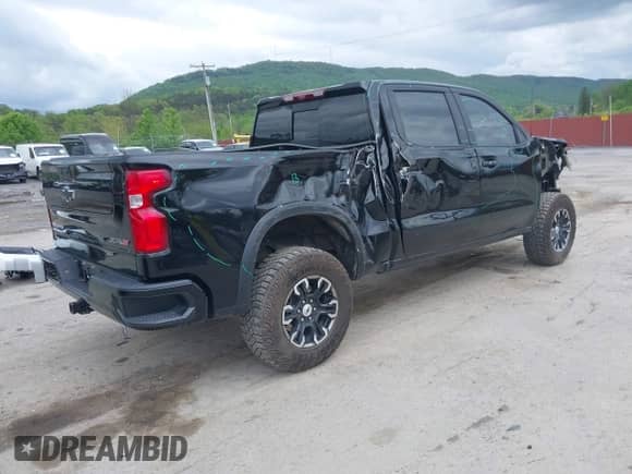 2023 Chevrolet Silverado 1500 ZR2 with VIN 3GCUDHEL0PG130793, listed as a IAAI auction lot 42187853 with 32,727 mi miles and . Bid and sale history available at DreamBid. Image 4.