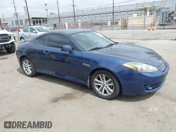 2007 Hyundai Tiburon GS with VIN KMHHM66D47U253809, listed as a IAAI auction lot 42777962 with 176,002 mi miles and . Bid and sale history available at DreamBid. Image 1.