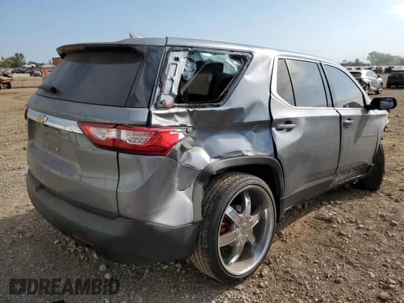 2020 Chevrolet Traverse LS z VIN 1GNERFKW7LJ299783, wystawiony jako Copart lot #80207195 z przebiegiem Nie podano mil oraz Szkoda całkowita • Salvage title. Historia ofert i sprzedaży dostępna na DreamBid. Obrazek 3.