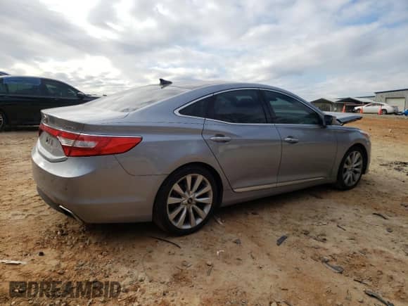 2015 Hyundai Azera Limited с VIN KMHFH4JG6FA487905, выставлен на аукционе Copart как лот 84620084 с пробегом 154 678 миль миль и Списание • Salvage title. История ставок и продаж доступна на DreamBid. Изображение 3.