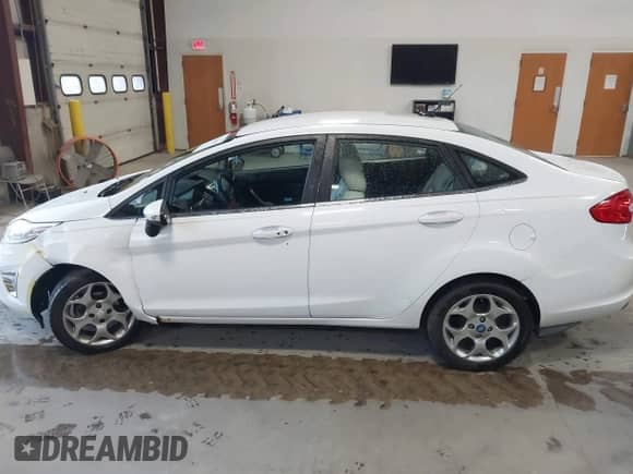 2012 Ford Fiesta SEL with VIN 3FADP4CJXCM161505, listed as a IAAI auction lot 42716954 with 153,982 mi miles and . Bid and sale history available at DreamBid. Image 14.