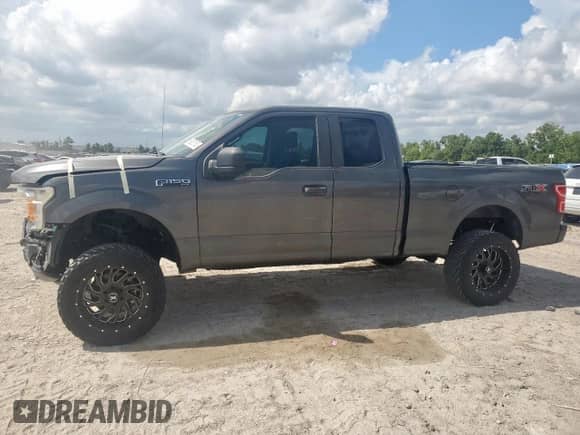 2018 Ford F-150 XL with VIN 1FTEX1CPXJKC45507, listed as a Copart auction lot 69080155 with 132,660 mi miles and Salvage title. Bid and sale history available at DreamBid. Image 1.