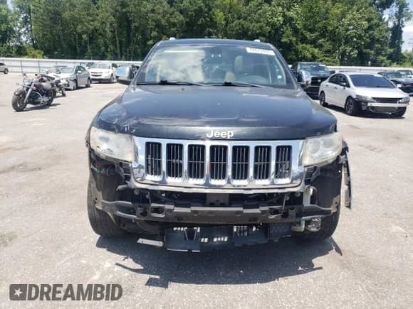 2012 Jeep Grand Cherokee Limited z VIN 1C4RJEBG7CC195450, wystawiony jako Copart lot #60673955 z przebiegiem 121 147 mil mil oraz Szkoda całkowita • Salvage title. Historia ofert i sprzedaży dostępna na DreamBid. Obrazek 5.