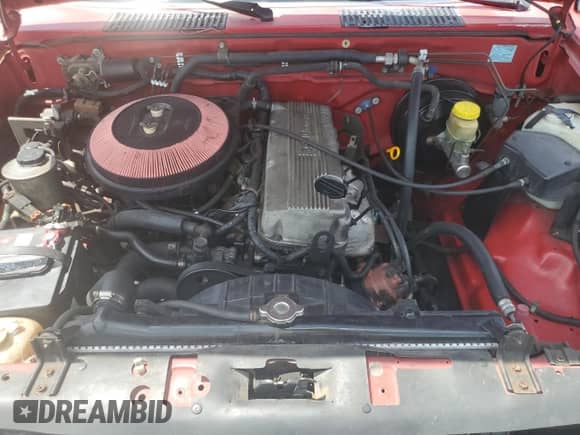 1997 Nissan Frontier XE with VIN 1N6SD11S5VC384265, listed as a Copart auction lot 62367885 with 186,882 mi miles and Salvage title. Bid and sale history available at DreamBid. Image 11.