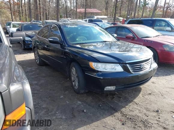 2009 Hyundai Azera Limited z VIN KMHFC46F59A428900, wystawiony jako IAAI lot #41234438 z przebiegiem 258 219 mil mil oraz . Historia ofert i sprzedaży dostępna na DreamBid. Obrazek 1.