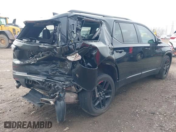 2020 Chevrolet Traverse Premier with VIN 1GNERKKW4LJ106546, listed as a IAAI auction lot 41953652 with 101,884 mi miles and . Bid and sale history available at DreamBid. Image 6.