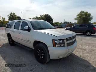 2011 Chevrolet Suburban LTZ with VIN 1GNSKKE30BR293390, listed as a IAAI auction lot 43187743 with 119,974 mi miles and . Bid and sale history available at DreamBid. Image 1.