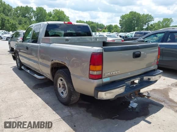 2003 GMC Sierra 1500 SLE with VIN 2GTEC19T031377419, listed as a IAAI auction lot 42665454 with 199,579 mi miles and . Bid and sale history available at DreamBid. Image 3.