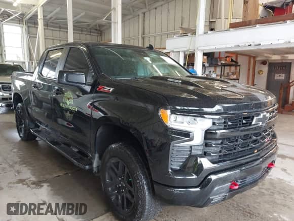 2024 Chevrolet Silverado 1500 LT Trail Boss with VIN 3GCUDFE83RG309753, listed as a IAAI auction lot 43305258 with 28,478 mi miles and . Bid and sale history available at DreamBid. Image 1.