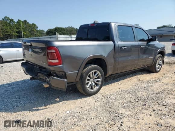 2021 Ram 1500 Laramie z VIN 1C6SRFJT4MN615516, wystawiony jako Copart lot #81212705 z przebiegiem 88 580 mil mil oraz Nie do naprawy • Non repairable. Historia ofert i sprzedaży dostępna na DreamBid. Obrazek 3.