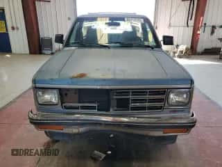 1990 Chevrolet Blazer z VIN 1GNCT18Z2L0107091, wystawiony jako Copart lot #80714795 z przebiegiem 203 095 mil mil oraz Szkoda całkowita • Salvage title. Historia ofert i sprzedaży dostępna na DreamBid. Obrazek 5.