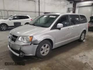 2012 Dodge Grand Caravan Crew with VIN 2C4RDGDG4CR292421, listed as a Copart auction lot 82572925 with 123,677 mi miles and Salvage title. Bid and sale history available at DreamBid. Image 1.