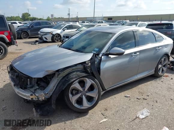 2018 Honda Accord Touring z VIN 1HGCV1F91JA065883, wystawiony jako IAAI lot #43093859 z przebiegiem 81 981 mil mil oraz . Historia ofert i sprzedaży dostępna na DreamBid. Obrazek 17.