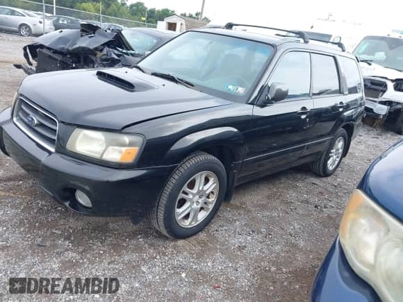 2004 Subaru Forester XT with VIN JF1SG69654H730661, listed as a IAAI auction lot 42940157 with 130,964 mi miles and . Bid and sale history available at DreamBid. Image 2.