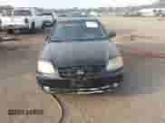 2005 Hyundai Accent GLS z VIN KMHCG35CX5U332441, wystawiony jako IAAI lot #43217479 z przebiegiem 225 254 mil mil oraz . Historia ofert i sprzedaży dostępna na DreamBid. Obrazek 12.