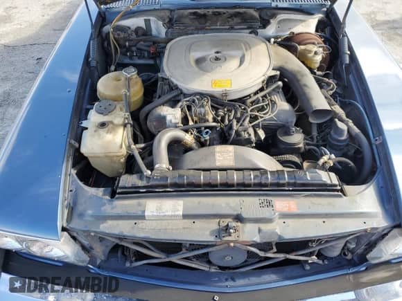 1984 Mercedes-Benz 380 SL z VIN WDBBA45A0EA010252, wystawiony jako Copart lot #85311625 z przebiegiem 75 448 mil mil oraz Szkoda całkowita • Salvage title. Historia ofert i sprzedaży dostępna na DreamBid. Obrazek 11.