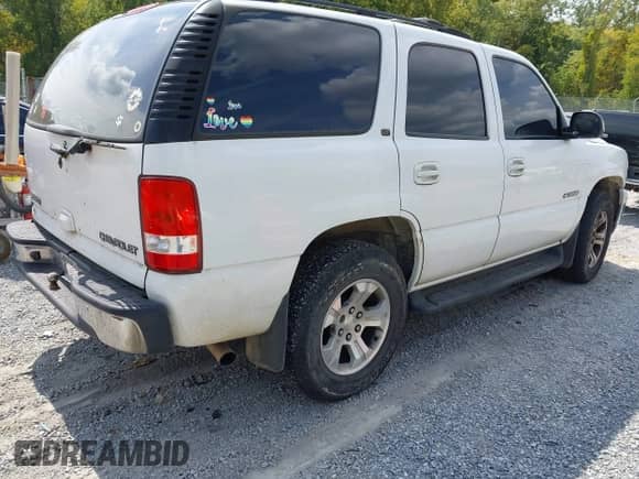 2002 Chevrolet Tahoe LT z VIN 1GNEK13Z42J197579, wystawiony jako IAAI lot #43212866 z przebiegiem 313 693 mil mil oraz . Historia ofert i sprzedaży dostępna na DreamBid. Obrazek 4.