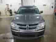 2016 Dodge Journey SE z VIN 3C4PDCAB9GT186896, wystawiony jako Copart lot #66667785 z przebiegiem 202 884 mil mil oraz Szkoda całkowita • Salvage title. Historia ofert i sprzedaży dostępna na DreamBid. Obrazek 5.