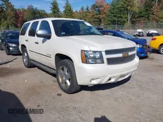 2012 Chevrolet Tahoe LTZ with VIN 1GNSKCE04CR116578, listed as a IAAI auction lot 43337709 with 251,212 mi miles and . Bid and sale history available at DreamBid. Image 1.