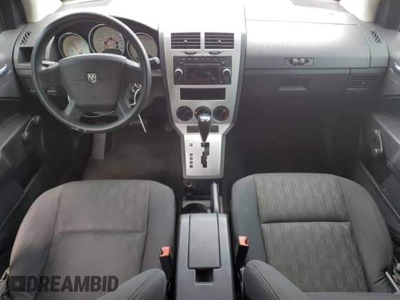 2009 Dodge Caliber SE with VIN 1B3HB28A69D258777, listed as a Copart auction lot 56851875 with 129,819 mi miles and Clean title. Bid and sale history available at DreamBid. Image 8.