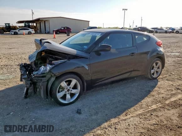 2015 Hyundai Veloster z VIN KMHTC6AD4FU245065, wystawiony jako Copart lot #68655815 z przebiegiem 120 922 mil mil oraz Szkoda całkowita • Salvage title. Historia ofert i sprzedaży dostępna na DreamBid. Obrazek 1.