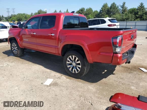 2021 Toyota Tacoma Limited with VIN 3TMGZ5AN4MM435182, listed as a Copart auction lot 64042295 with 73,697 mi miles and Salvage title. Bid and sale history available at DreamBid. Image 2.