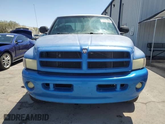 2000 Dodge 1500 z VIN 3B7HF13Z9YM214706, wystawiony jako Copart lot #61821855 z przebiegiem 223 734 mil mil oraz Szkoda całkowita • Salvage title. Historia ofert i sprzedaży dostępna na DreamBid. Obrazek 5.