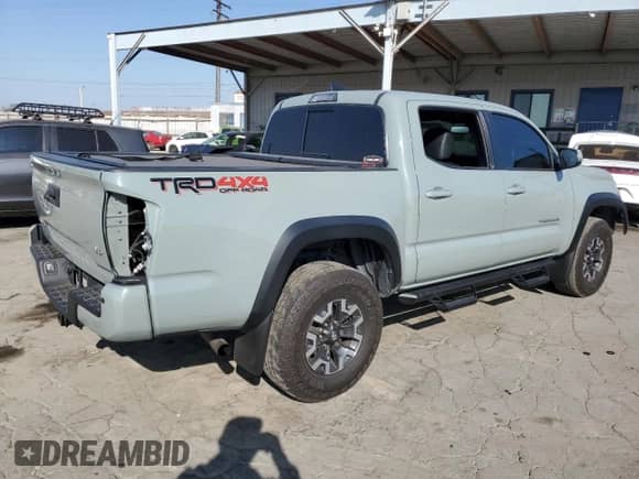 2022 Toyota Tacoma TRD Off Road с VIN 3TMCZ5AN6NM494685, выставлен на аукционе Copart как лот 82319385 с пробегом 42 267 миль миль и Списание • Salvage title. История ставок и продаж доступна на DreamBid. Изображение 3.