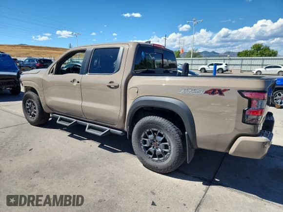 2024 Nissan Frontier Pro-4X with VIN 1N6ED1EK5RN613089, listed as a Copart auction lot 71288745 with 6,282 mi miles and Salvage title. Bid and sale history available at DreamBid. Image 2.