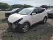 2013 Hyundai Santa Fe Sport z VIN 5XYZUDLA2DG103265, wystawiony jako Copart lot #64164445 z przebiegiem 124 169 mil mil oraz Szkoda całkowita • Salvage title. Historia ofert i sprzedaży dostępna na DreamBid. Obrazek 1.